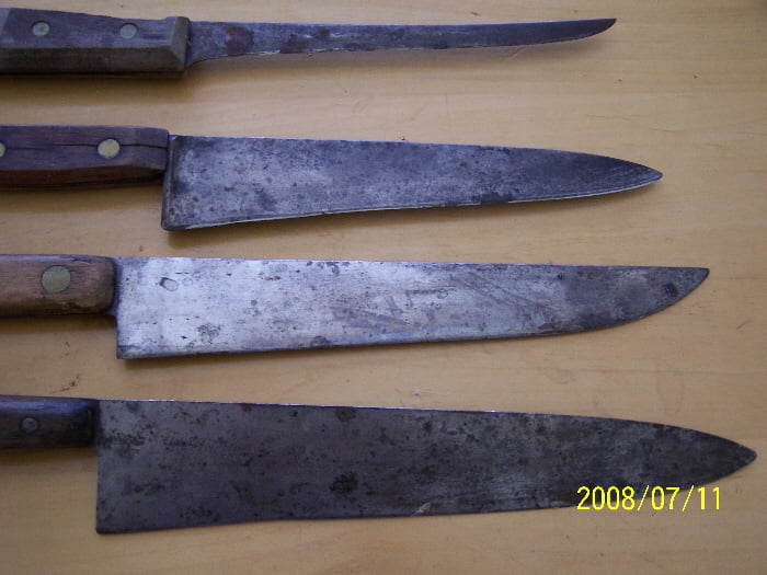 Top two knives with handles removed . The steel on the handle will need to be scoured down to clean steel without making the steel so thin as to make the steel to thin. 