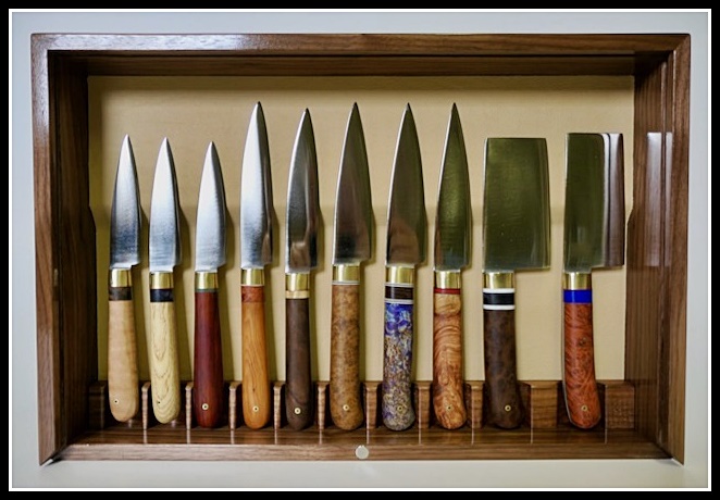 The first 10 of 20 steak knives in the set, showing 4 sizes and shapes