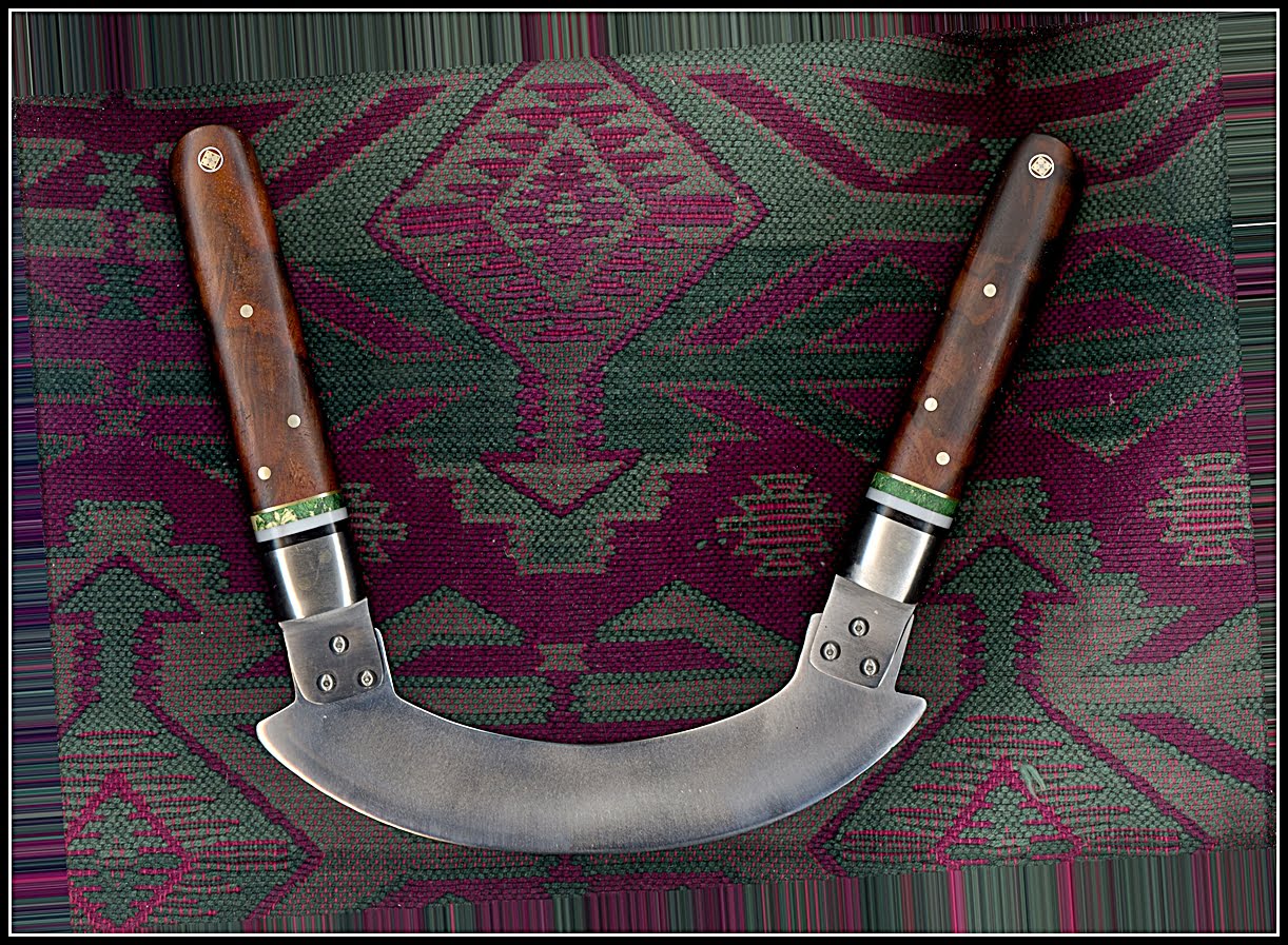 Mezzaluna with spacers on the handle with green dyed Box Elder burl wood, stainless bolsters and walnut wood. 
