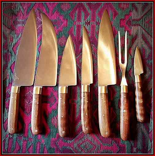 2nd from left -  9″ x 2.5″ scimitar shaped Boning knife in a Kitchen knife set